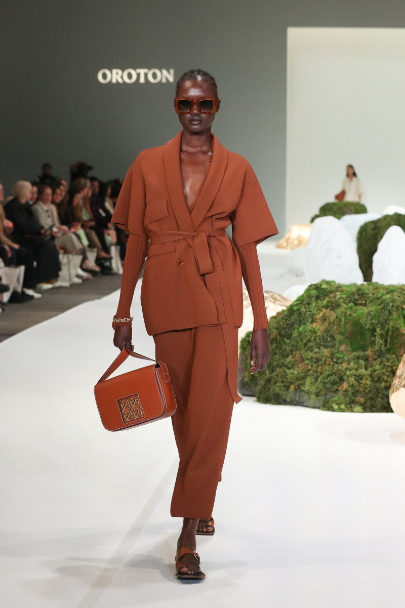 Abeny Nhial featured in  the Oroton fashion show for Resort 2022