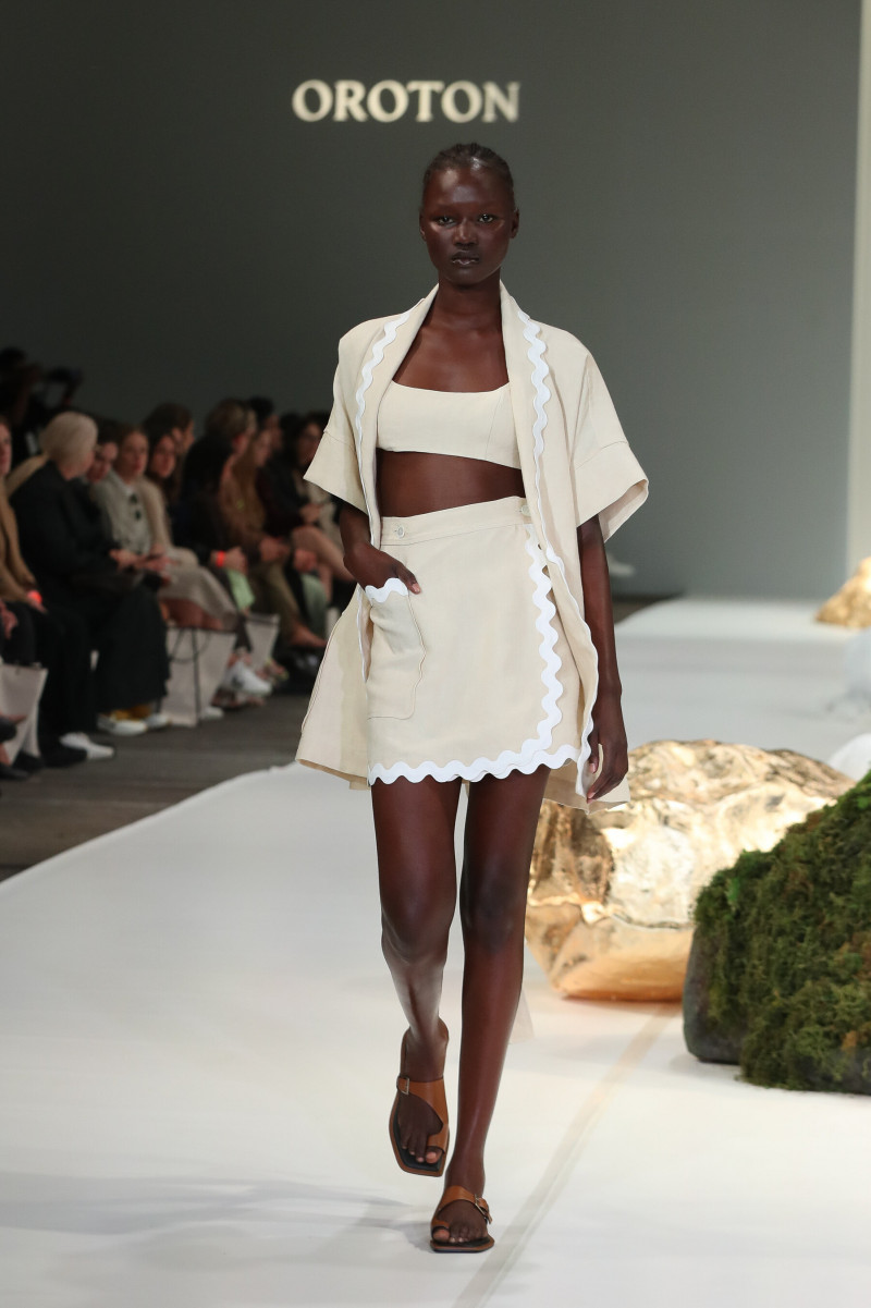 Abeny Nhial featured in  the Oroton fashion show for Resort 2022