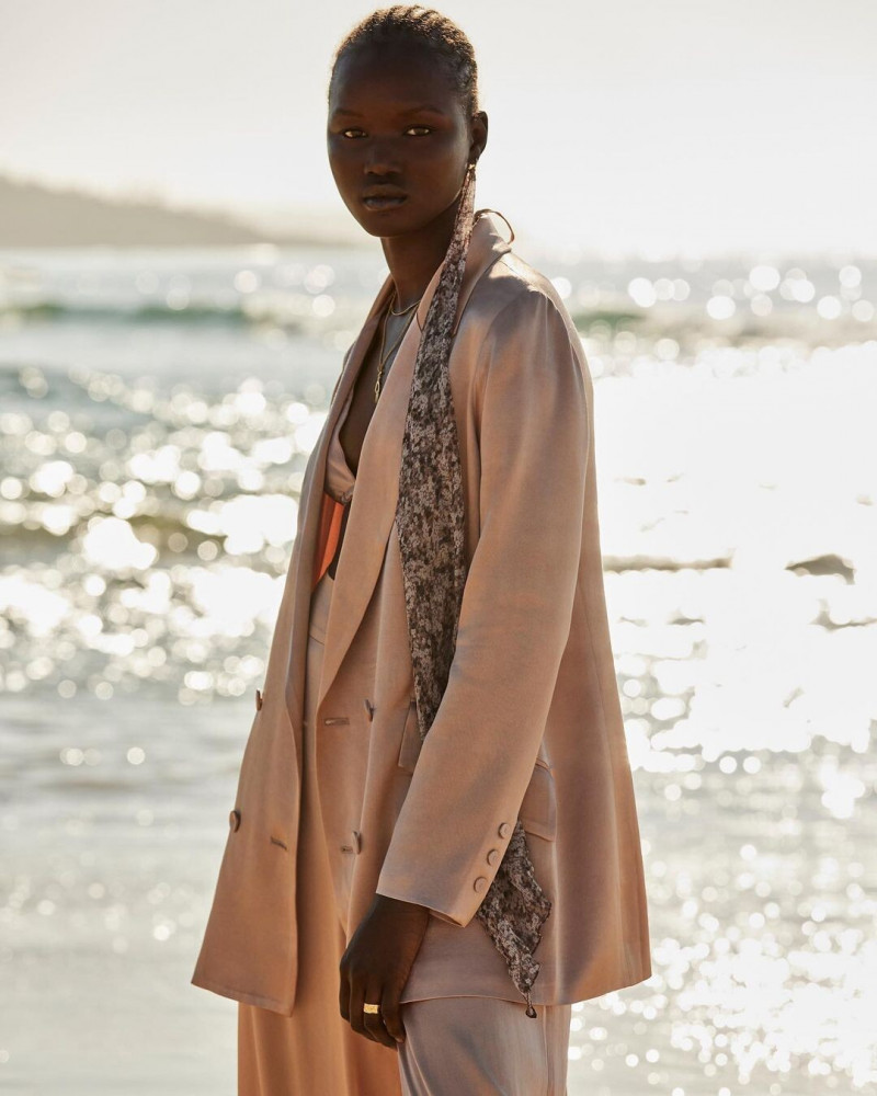 Abeny Nhial featured in  the Shona Joy lookbook for Resort 2022