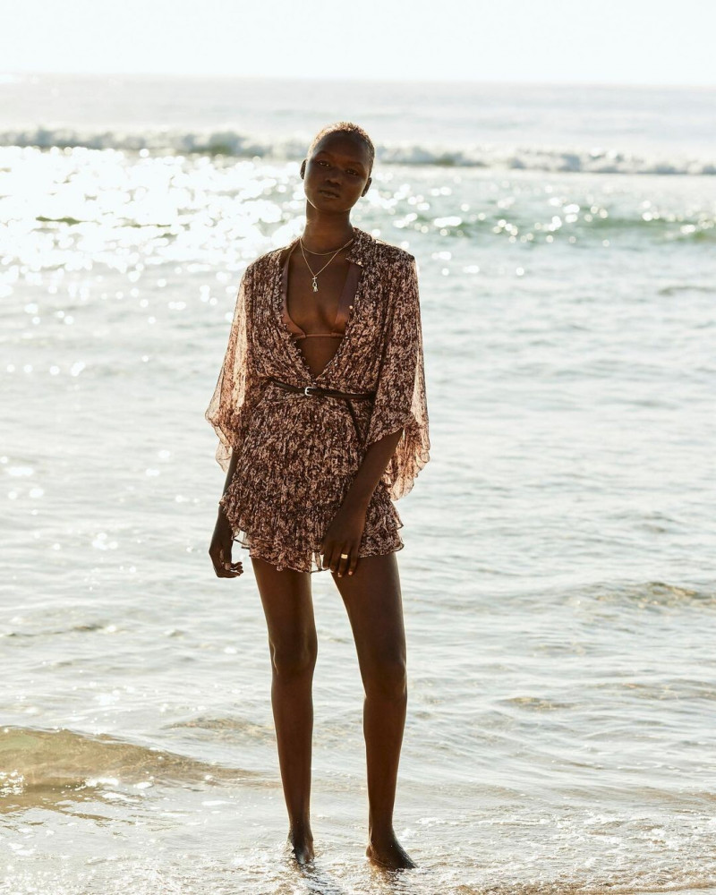 Abeny Nhial featured in  the Shona Joy lookbook for Resort 2022