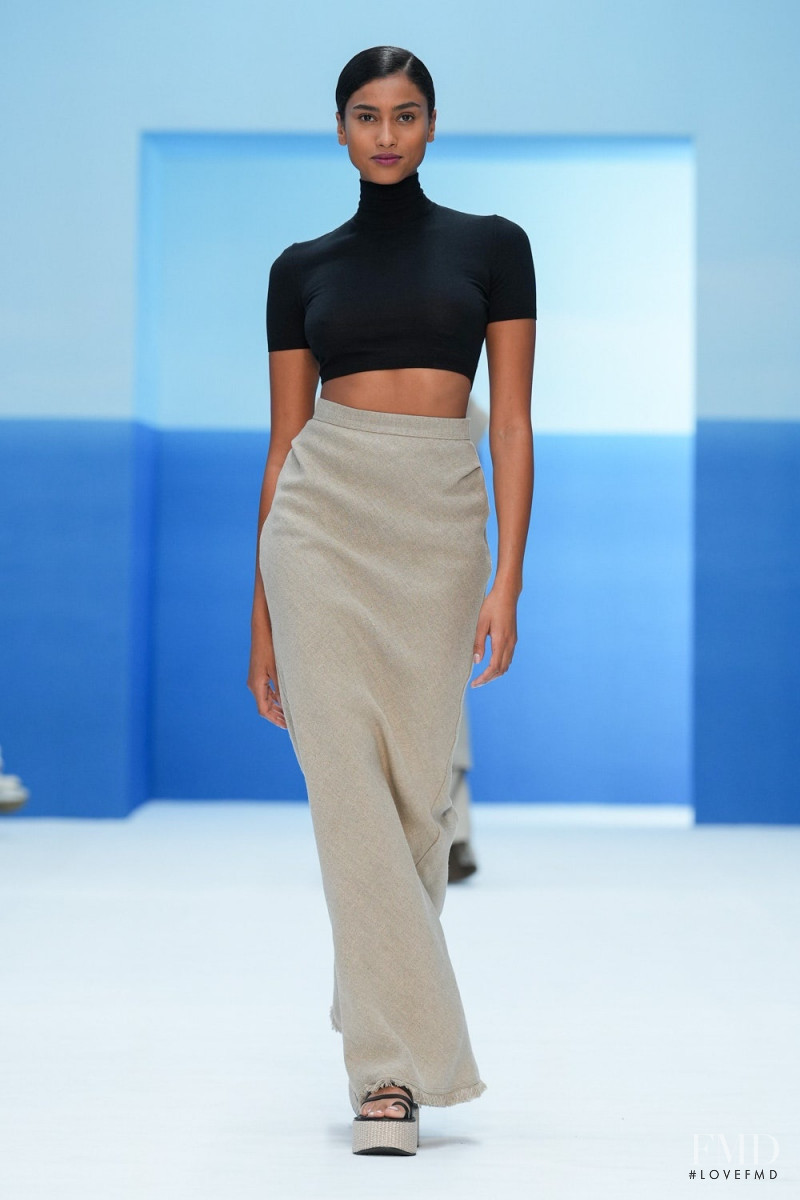 Imaan Hammam featured in  the Max Mara fashion show for Spring/Summer 2023