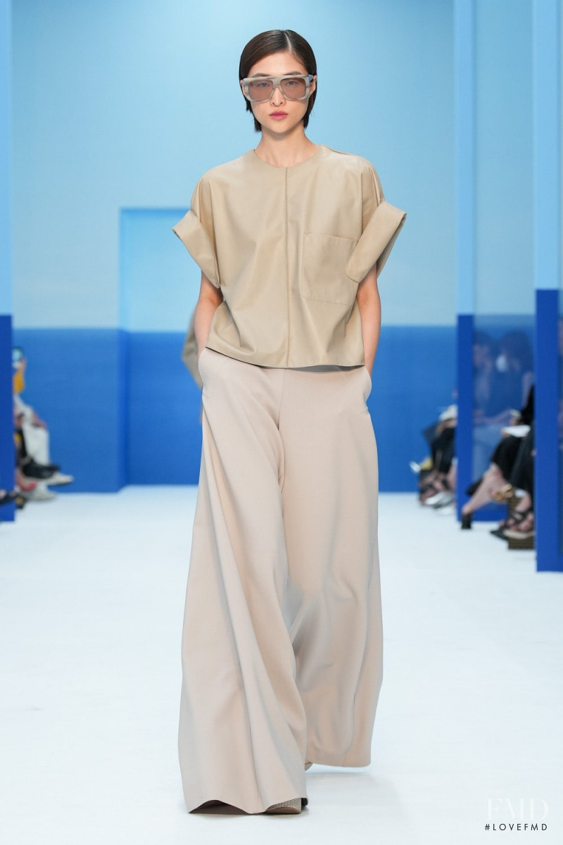 Chu Wong featured in  the Max Mara fashion show for Spring/Summer 2023