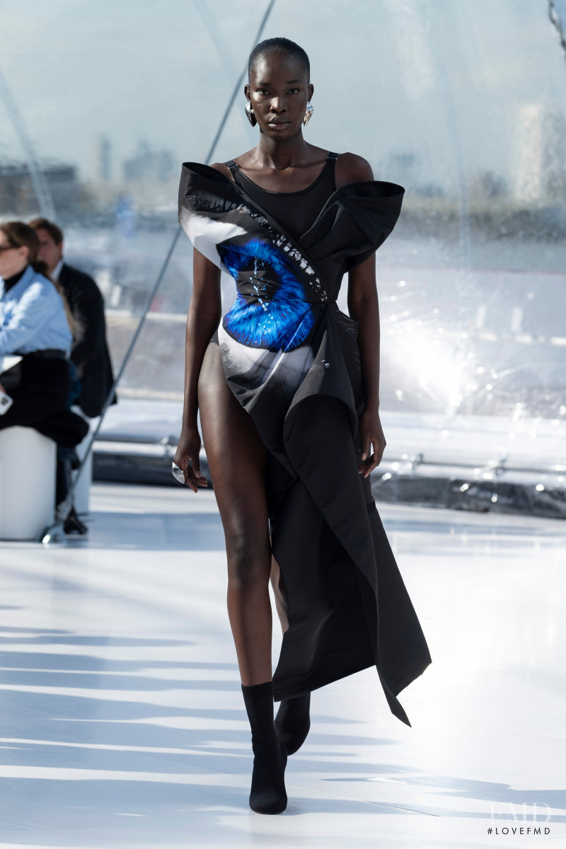 Adhel Bol featured in  the Alexander McQueen fashion show for Spring/Summer 2023