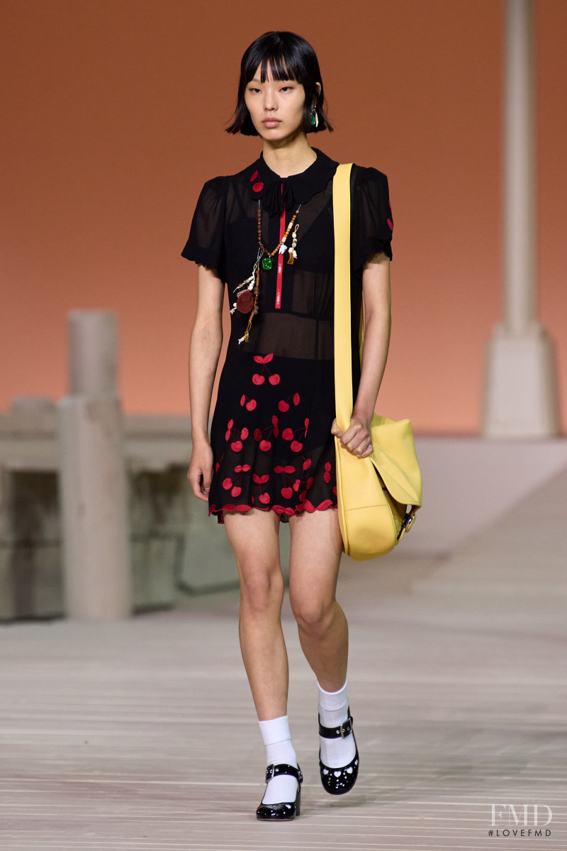 Feng Qisi featured in  the Coach fashion show for Spring/Summer 2023