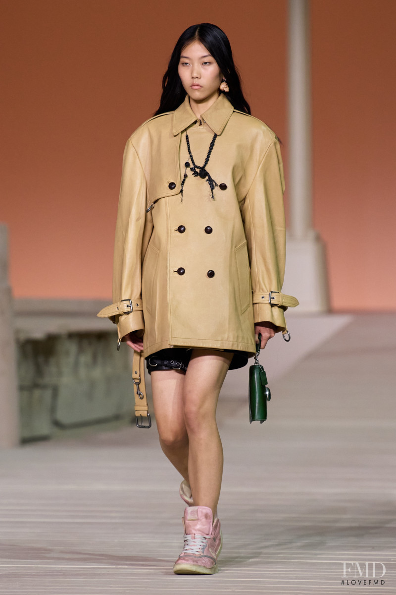 Erin Kim featured in  the Coach fashion show for Spring/Summer 2023