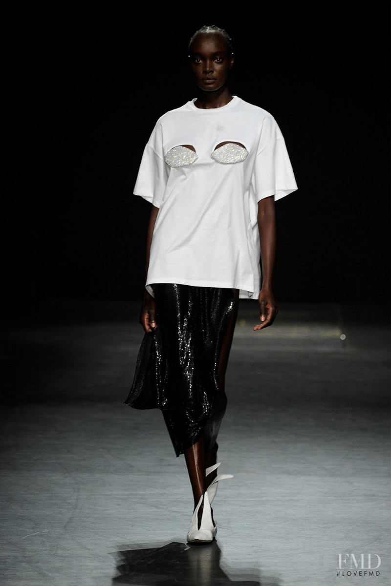 Ayuol Manyok featured in  the Christopher Kane fashion show for Spring/Summer 2023