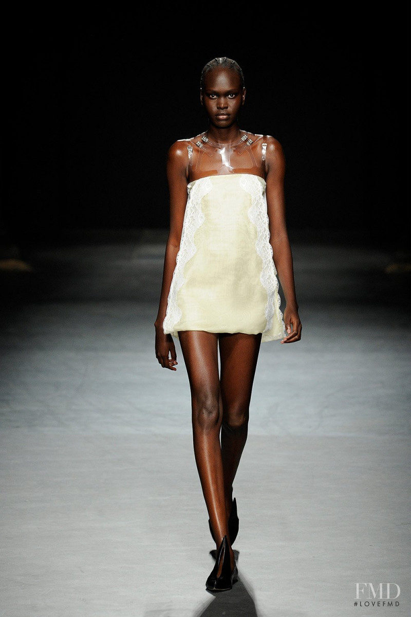 Nyibol Dok Jok featured in  the Christopher Kane fashion show for Spring/Summer 2023