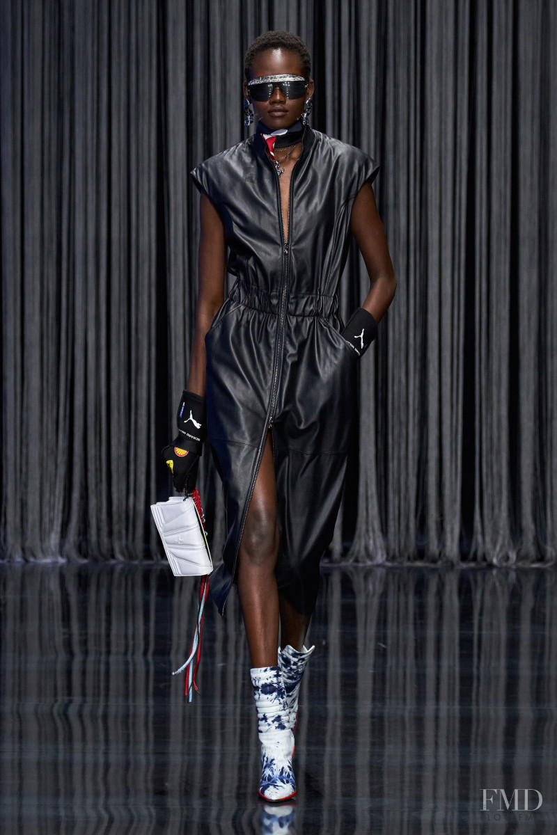 Caren Jepkemei featured in  the Ferrari Concept fashion show for Spring/Summer 2023