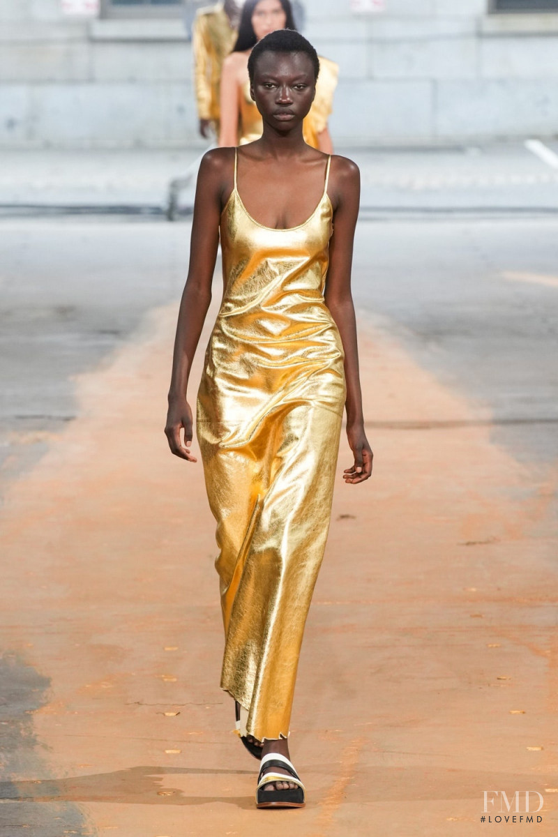 Anyiang Yak featured in  the Gabriela Hearst fashion show for Spring/Summer 2023