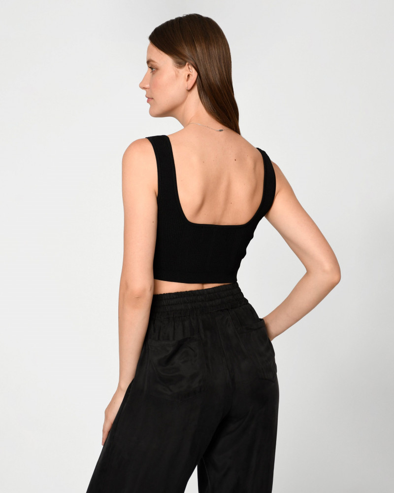 Oksana Gedroit featured in  the Nicole Miller catalogue for Summer 2022