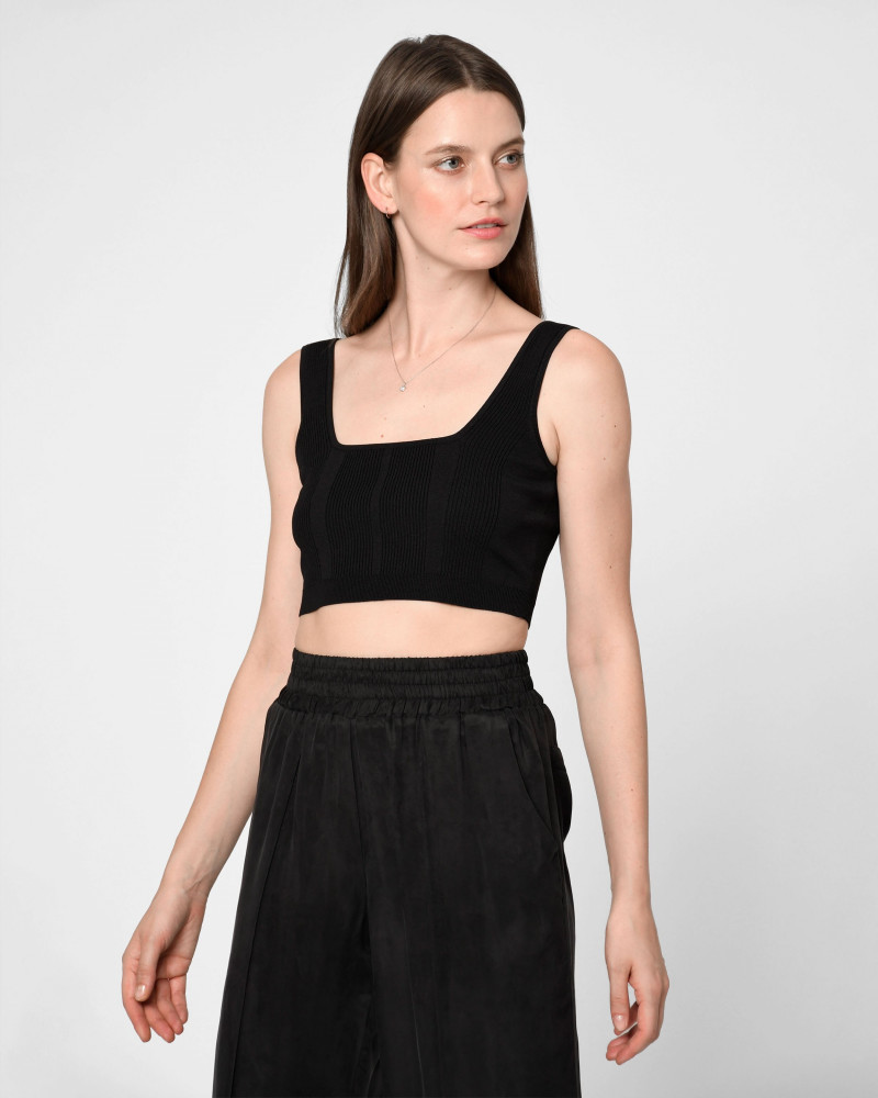 Oksana Gedroit featured in  the Nicole Miller catalogue for Summer 2022