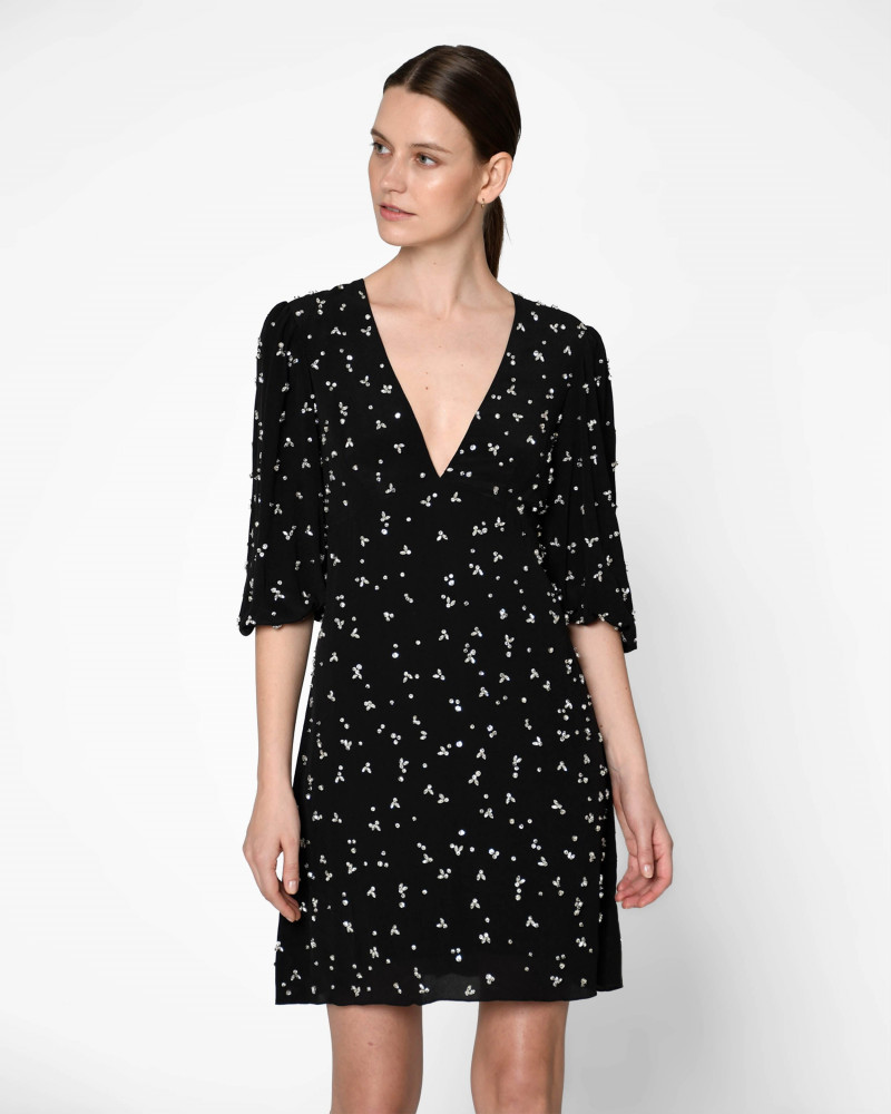 Oksana Gedroit featured in  the Nicole Miller catalogue for Summer 2022