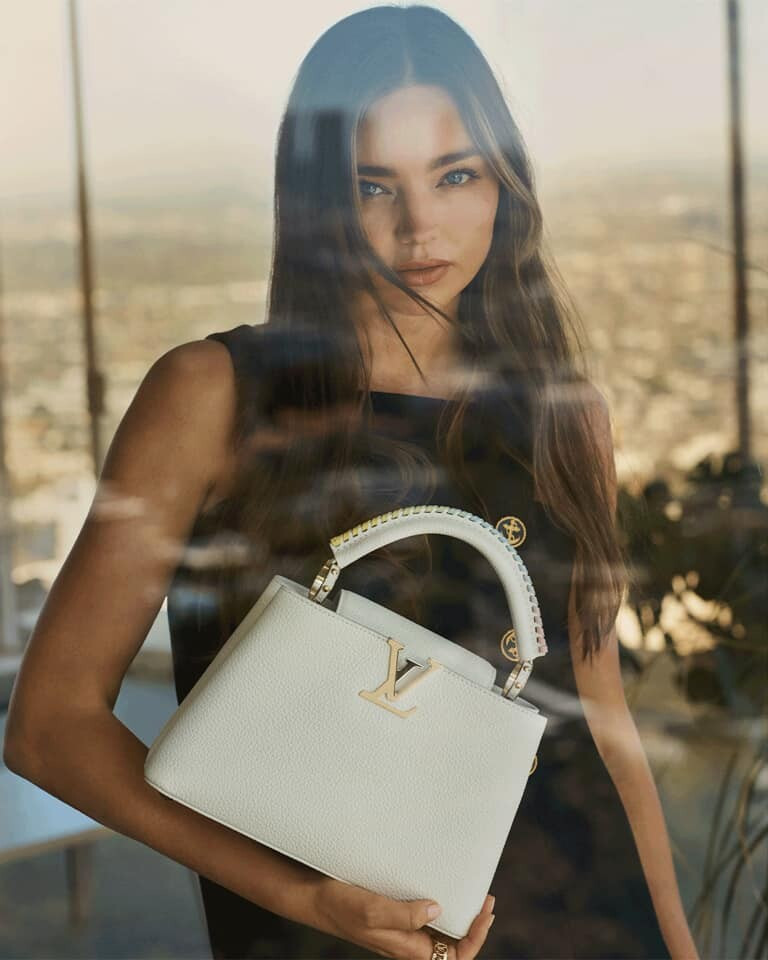 Miranda Kerr featured in  the Louis Vuitton Capucines advertisement for Summer 2021