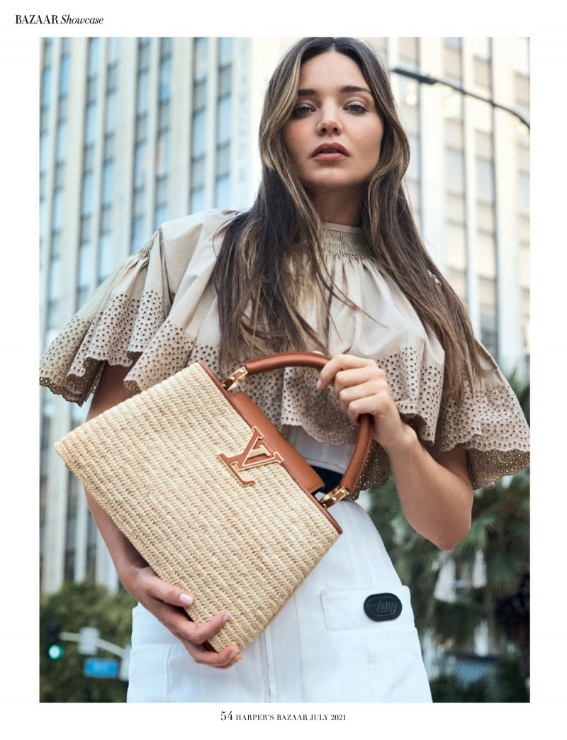 Miranda Kerr featured in  the Louis Vuitton Capucines advertisement for Summer 2021