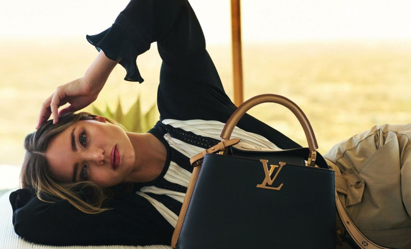 Miranda Kerr featured in  the Louis Vuitton Capucines advertisement for Summer 2021