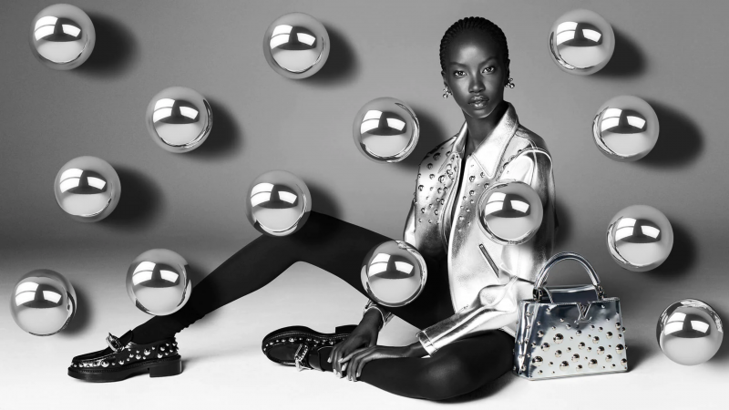 Anok Yai featured in  the Louis Vuitton Louis Vuitton x Yayoi Kusama Global Campaign advertisement for Holiday 2022