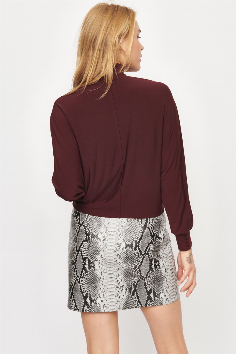 Brooke Perry featured in  the Dynamite catalogue for Holiday 2019