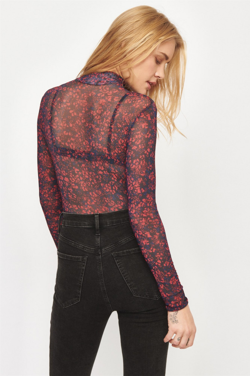 Brooke Perry featured in  the Dynamite catalogue for Holiday 2019