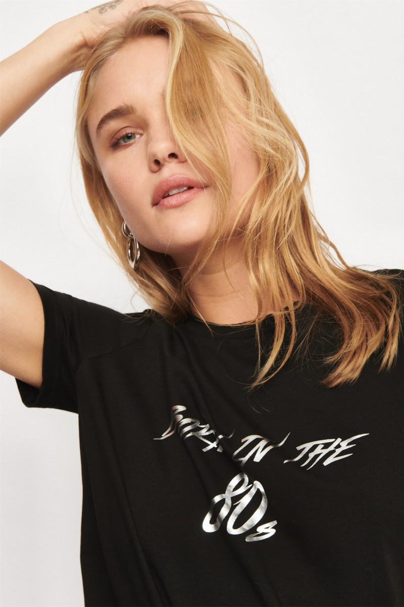 Brooke Perry featured in  the Dynamite catalogue for Holiday 2019