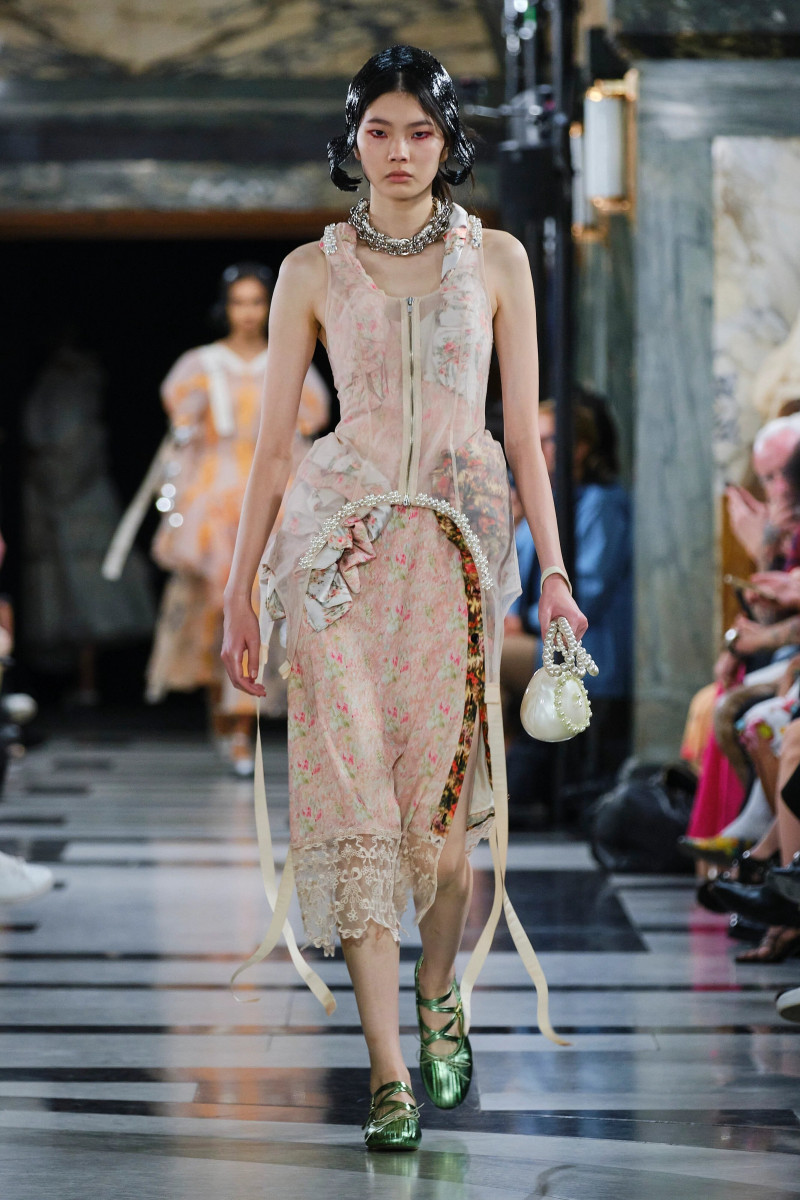 Sherry Shi featured in  the Simone Rocha fashion show for Spring/Summer 2023
