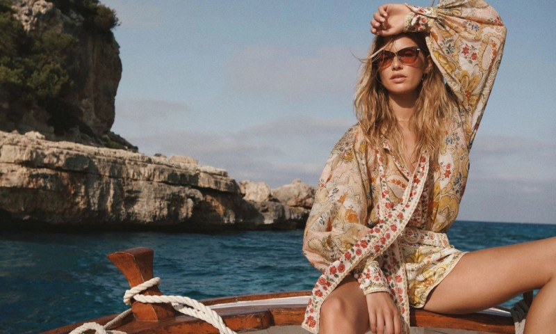 Anna Ewers featured in  the Zimmermann Swim advertisement for Resort 2023