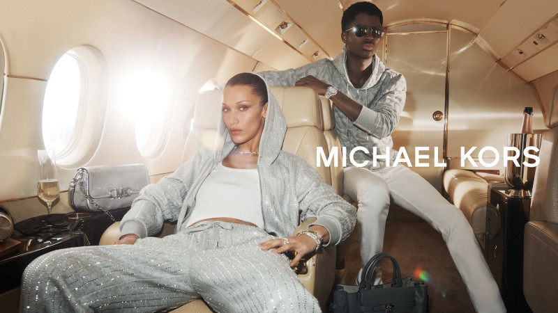 Alton Mason featured in  the Michael Kors Collection advertisement for Holiday 2022