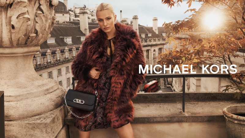 Felice Noordhoff featured in  the Michael Kors Collection advertisement for Holiday 2022