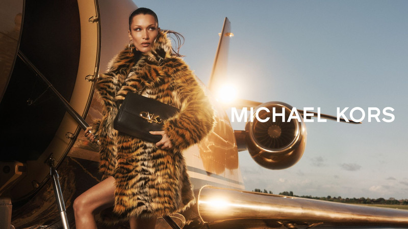 Bella Hadid featured in  the Michael Kors Collection advertisement for Holiday 2022