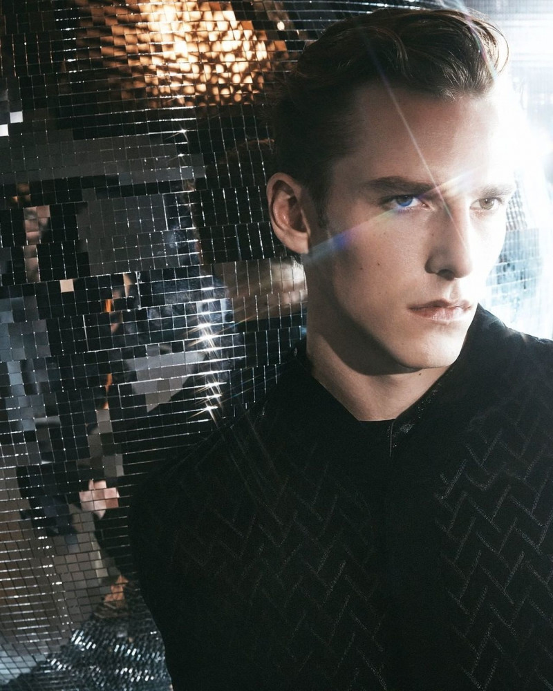 Quentin Demeester featured in  the Giorgio Armani advertisement for Holiday 2022