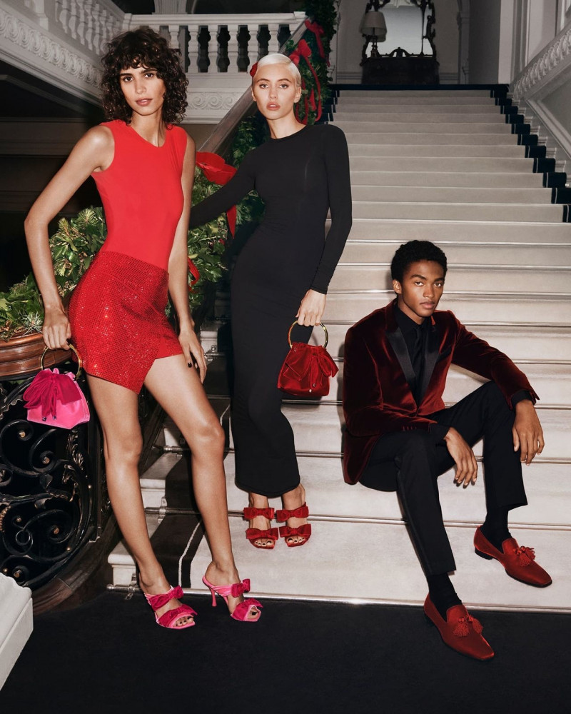 Iris Law featured in  the Jimmy Choo advertisement for Holiday 2022