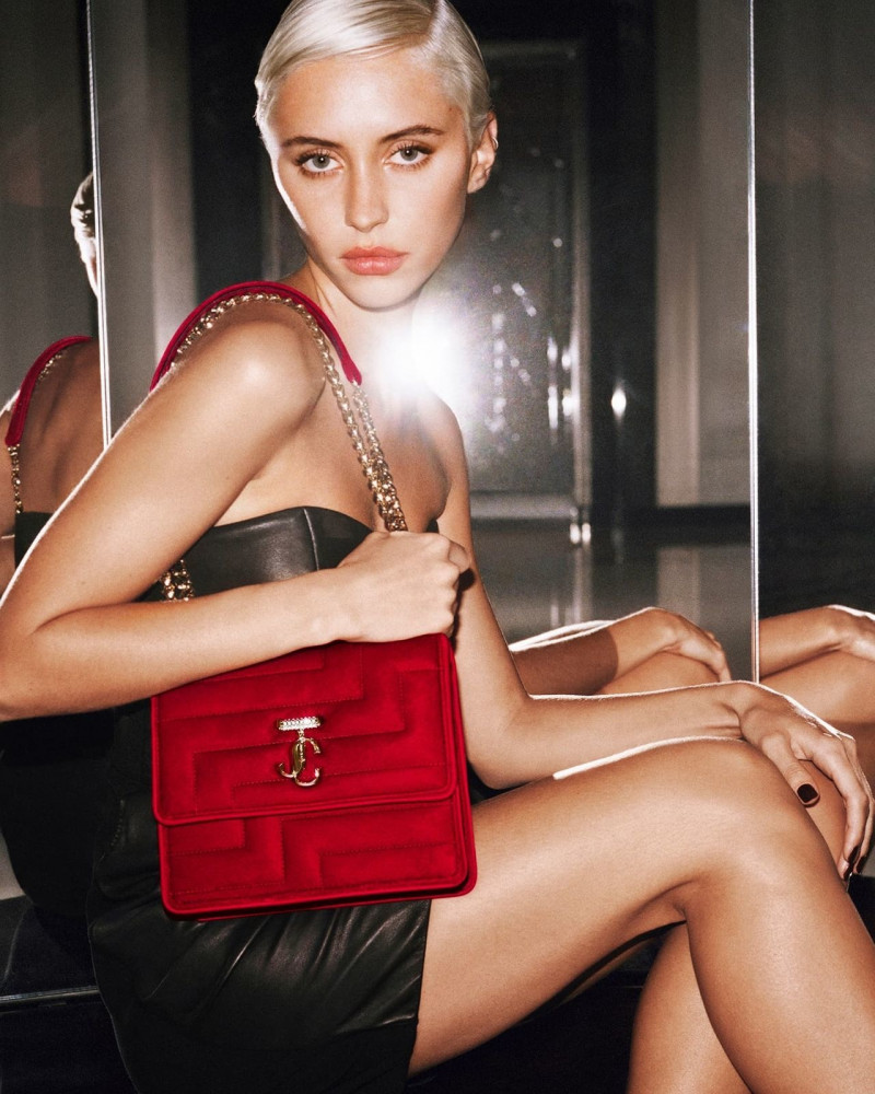 Iris Law featured in  the Jimmy Choo advertisement for Holiday 2022