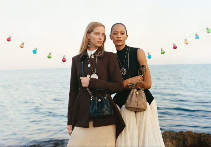 Abby Champion featured in  the Tory Burch advertisement for Holiday 2022