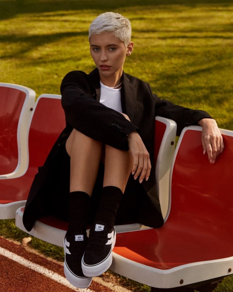 Iris Law featured in  the Superga advertisement for Fall 2022