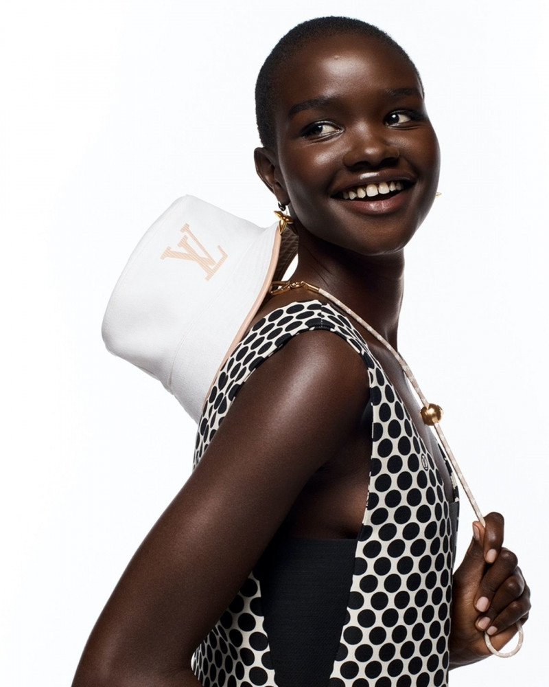 Akon Changkou featured in  the Louis Vuitton Spring In The City advertisement for Spring 2022