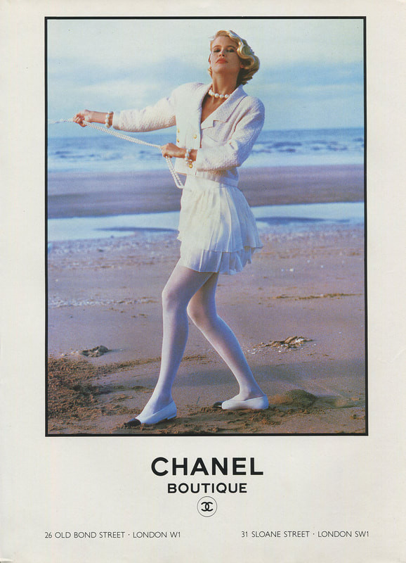 Claudia Schiffer featured in  the Chanel advertisement for Spring/Summer 1990