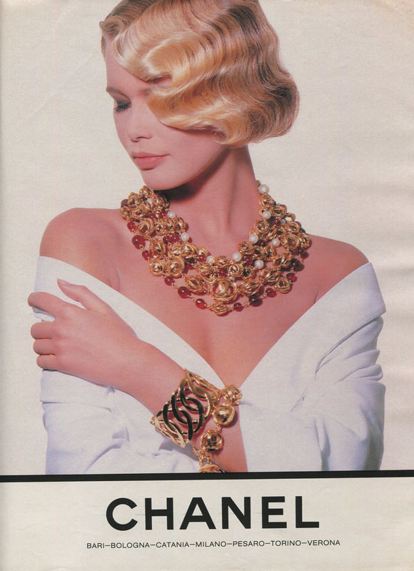 Claudia Schiffer featured in  the Chanel advertisement for Spring/Summer 1990