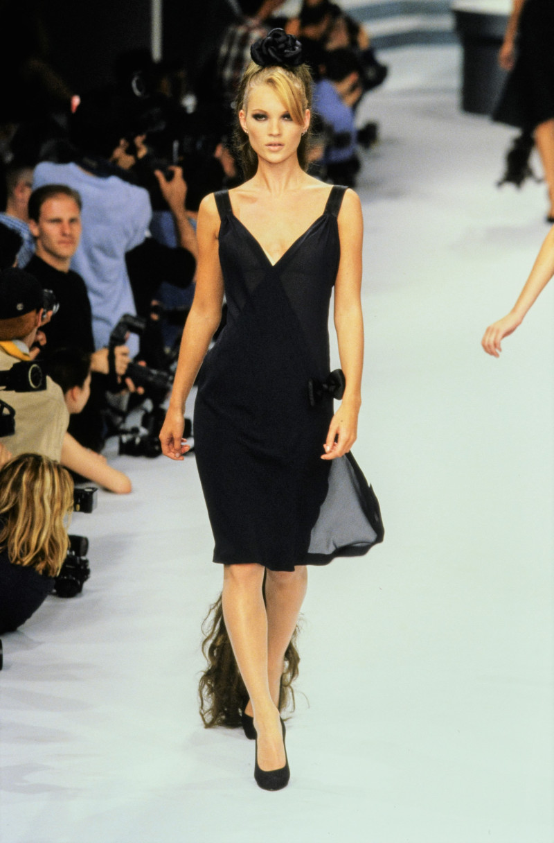 Kate Moss featured in  the Chanel Haute Couture fashion show for Autumn/Winter 1995