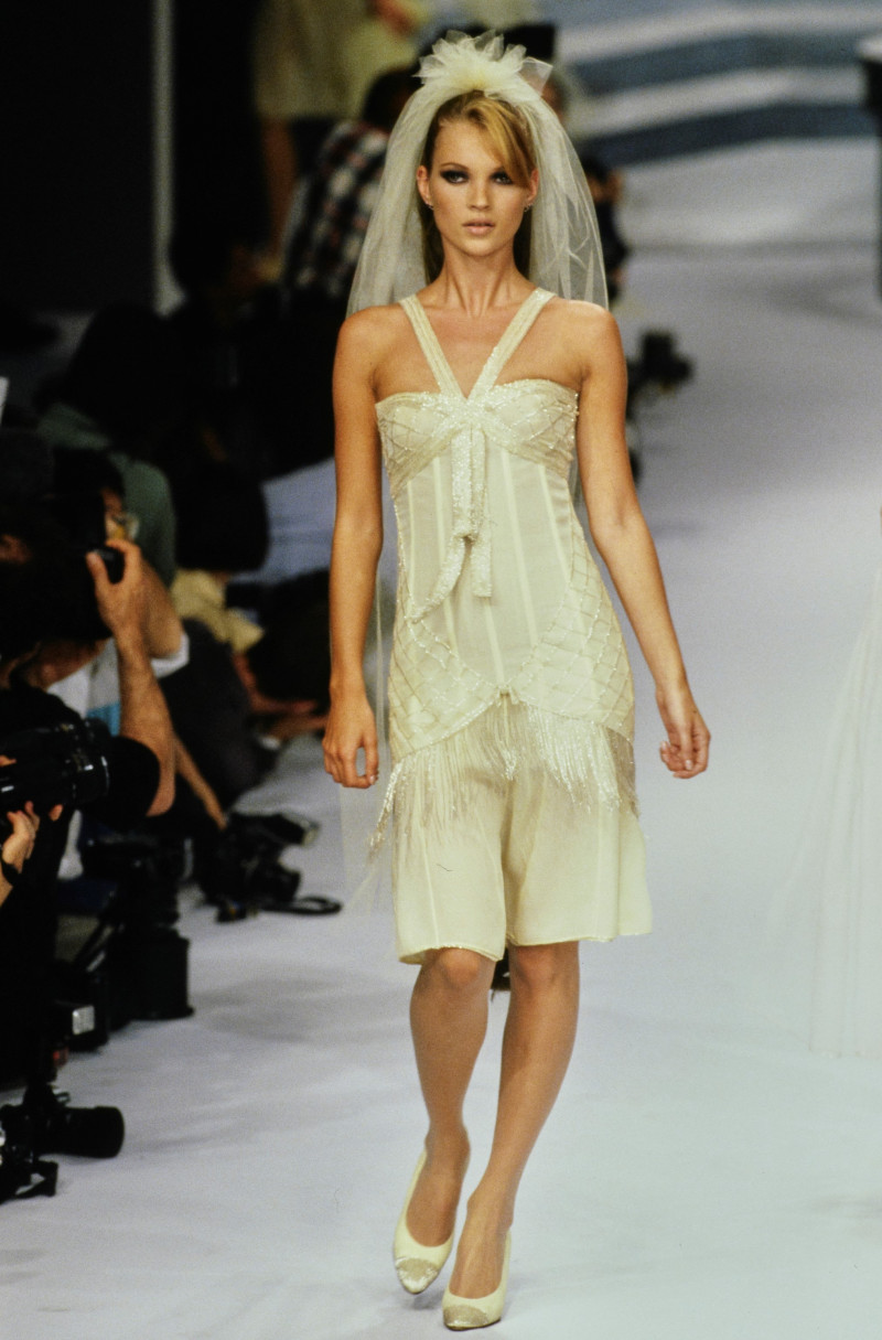 Kate Moss featured in  the Chanel Haute Couture fashion show for Autumn/Winter 1995