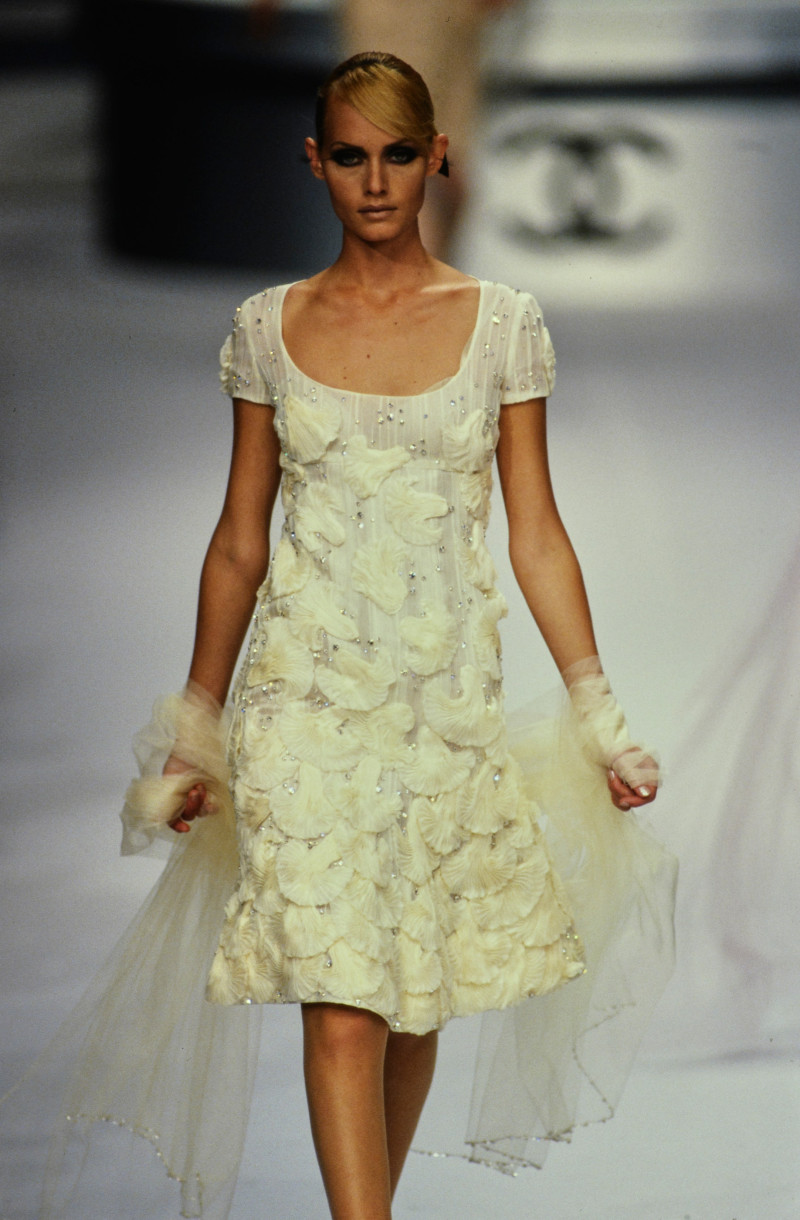 Amber Valletta featured in  the Chanel Haute Couture fashion show for Autumn/Winter 1995