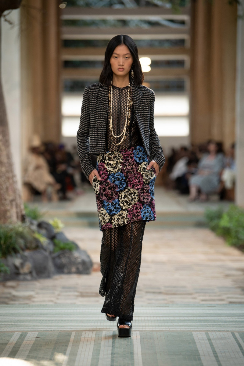 Yilan Hua featured in  the Chanel fashion show for Pre-Fall 2023