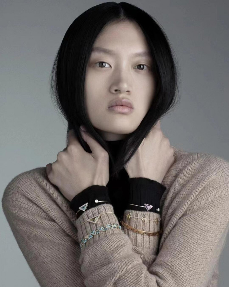 Yilan Hua featured in  the Prada Fine Jewellery advertisement for Winter 2021