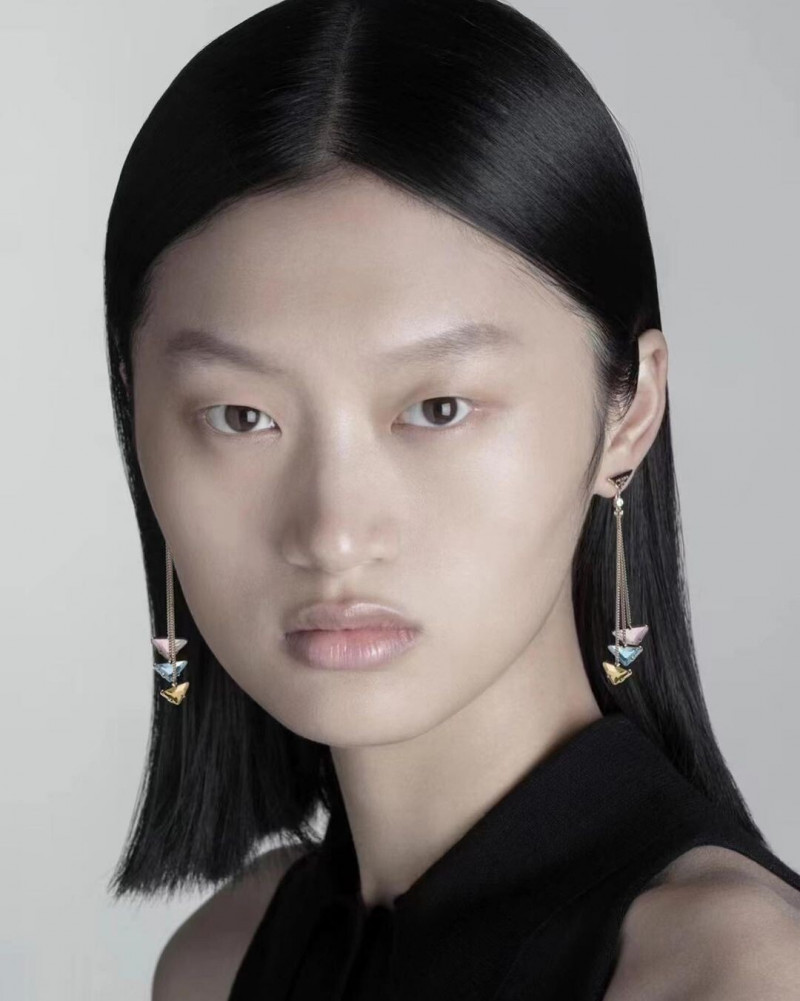 Yilan Hua featured in  the Prada Fine Jewellery advertisement for Winter 2021