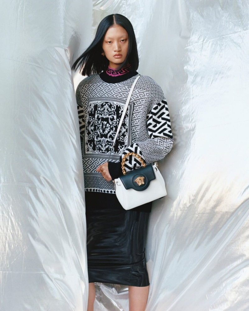 Yilan Hua featured in  the Versace advertisement for Pre-Fall 2022