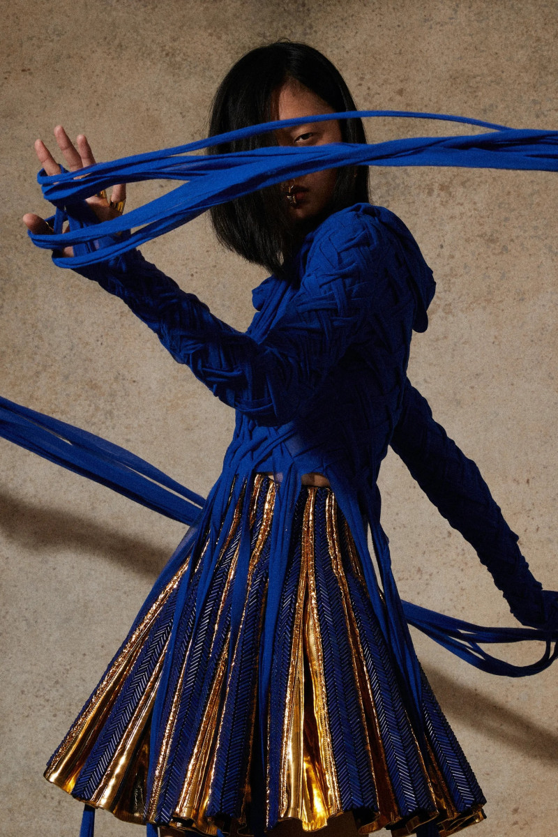 Yilan Hua featured in  the Balmain lookbook for Resort 2023