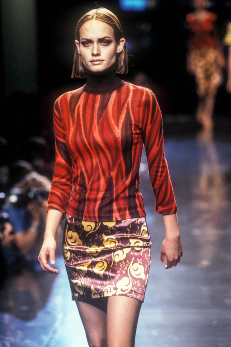 Amber Valletta featured in  the Versus fashion show for Spring/Summer 1997