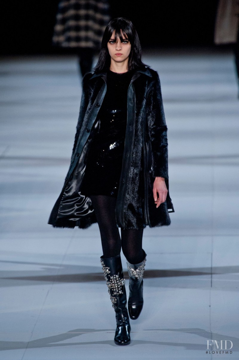 Magda Laguinge featured in  the Saint Laurent fashion show for Autumn/Winter 2014