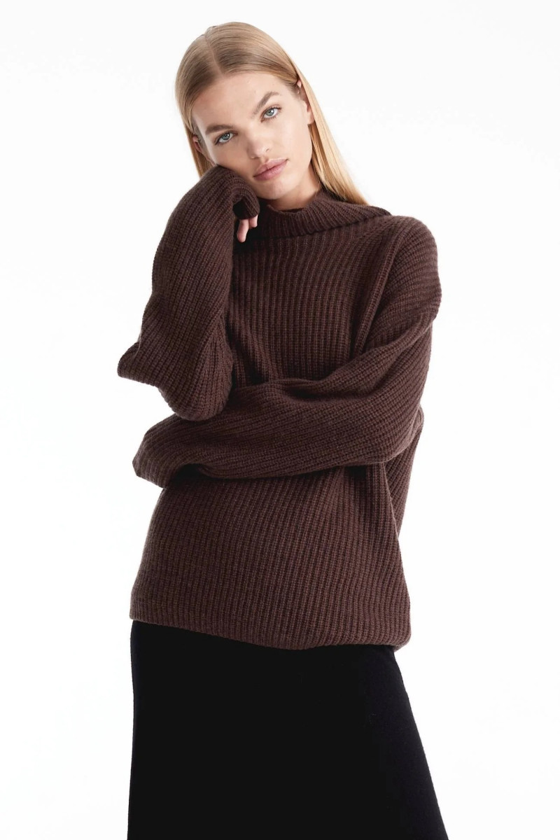 Daphne Groeneveld featured in  the Naked Cashmere advertisement for Holiday 2022