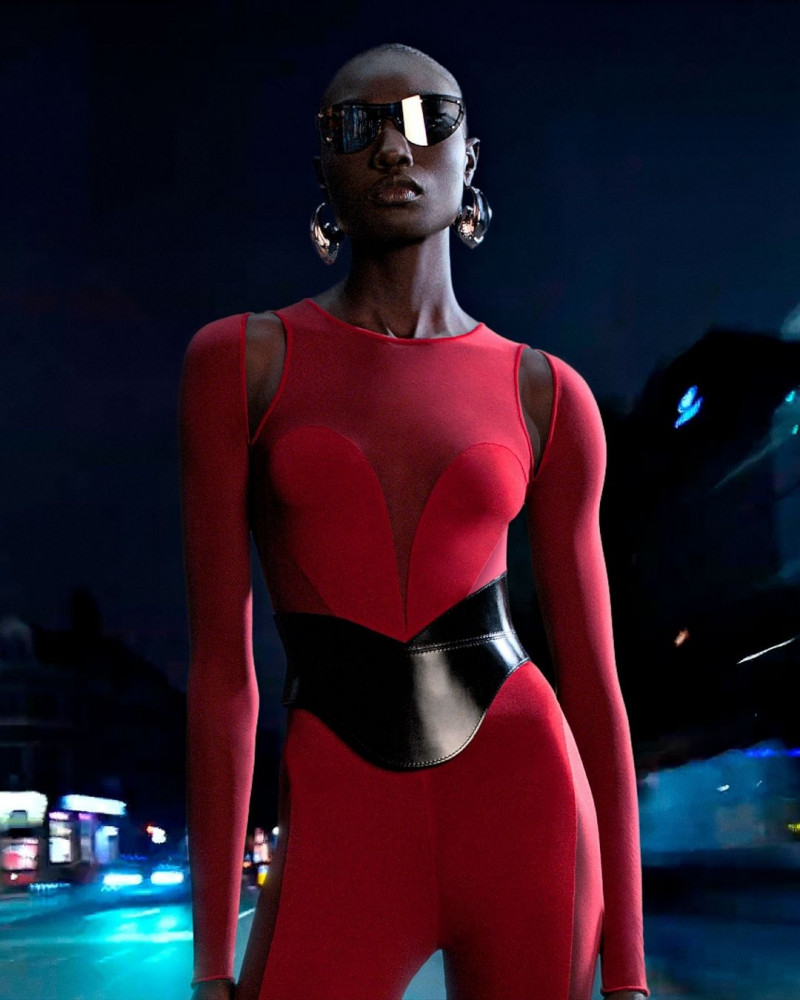 Nyagua Ruea featured in  the Alexander McQueen advertisement for Spring/Summer 2023