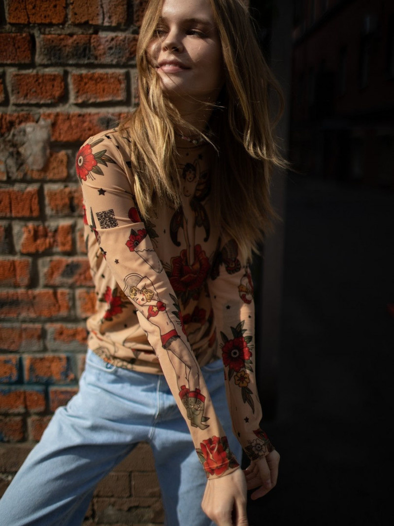 Anastasiya Scheglova featured in  the Brikoly lookbook for Spring/Summer 2022