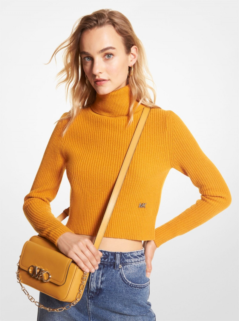 Maartje Verhoef featured in  the Michael Kors Collection catalogue for Autumn/Winter 2022